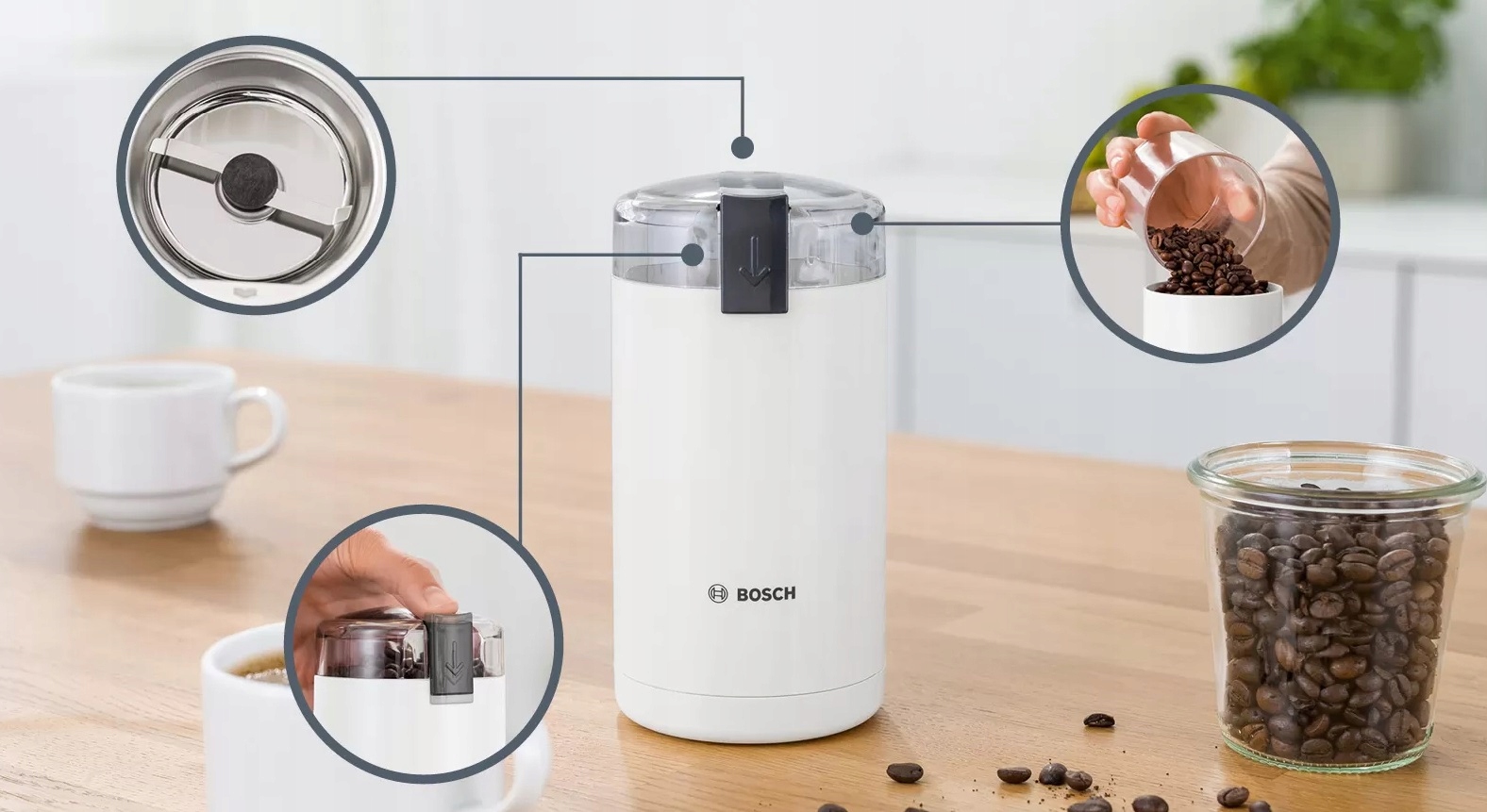 Bílý elektrický mlýnek na kávu Bosch TSM6A011W na kuchyňské lince
