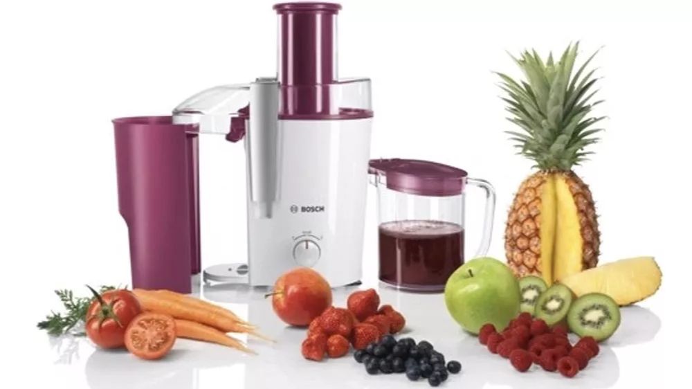 Odstředivý odšťavňovač Bosch VitaJuice MES25C0 v bílo-třešňovém provedení s dodávanou nádobou na šťávu