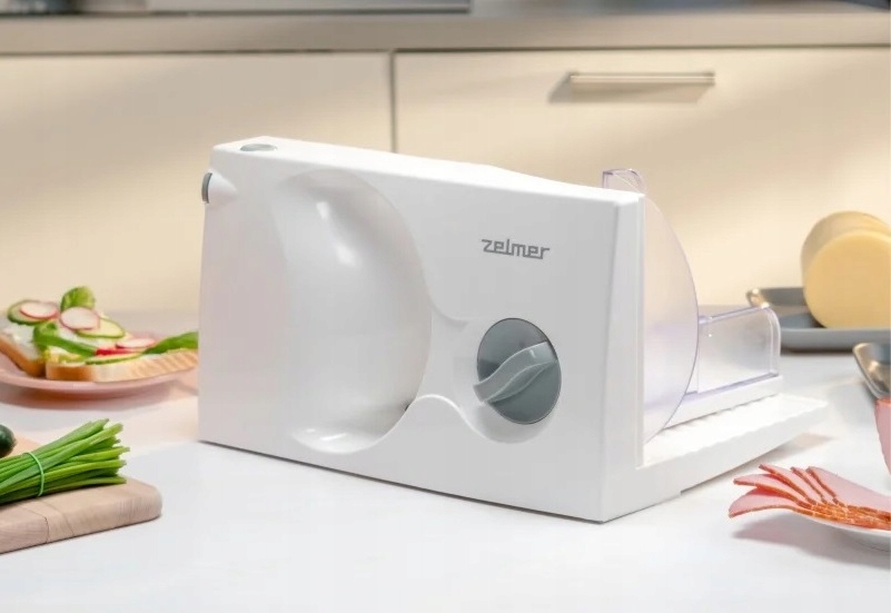 Kompaktní kráječ Zelmer 150 W s nerezovým kotoučem o průměru 17 cm