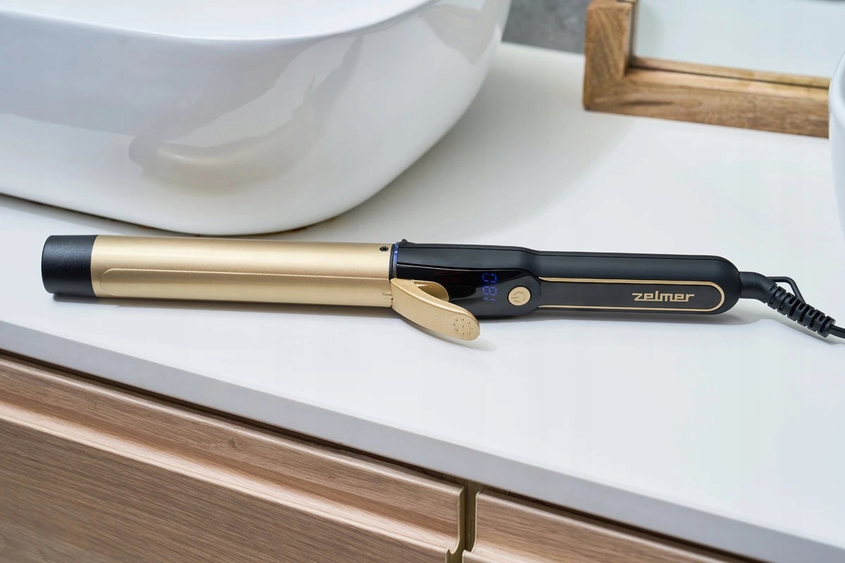 Elegantní designové detaily na těle kulmy v kombinaci černé a zlatožluté barvy